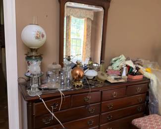 Antique dresser with mirror and oil lamp