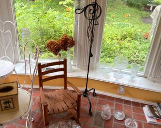 Child's ladderback chair and iron plant stand