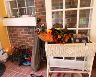 Wicker plant stand, golf clubs and decor