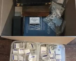 Watchmakers Clock Repair Parts Collection with Balance Staffs, Crystals, Crowns, Reference Manual