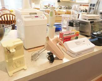 Bread maker, pink hand mixer