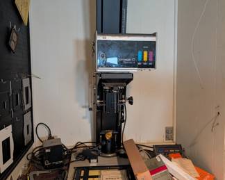 Large format camera, photography accessories, professional imaging equipment, darkroom supplies, and commercial photography tools.