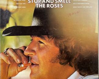 Mac Davis stop and smell the roses
