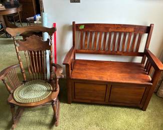 Old rocking chair and wooden bench that opens for storage