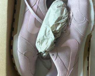 Tons of brand new shoes in the box