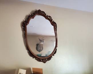 This is a second ornate vintage mirror