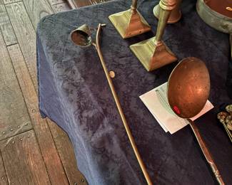 long brass snuffer