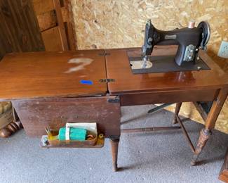 Domestic rotary sewing machine table