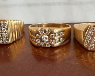 mens gold/diamond rings (not left on property)