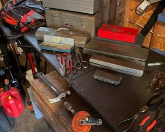 Several emptycraftsman toolboxes, socket sets, tinsnips and vintage crank drill.