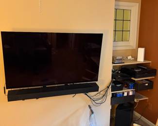 LG OLED 55" Flat screen TV with SONY SA-ST5000 surround sound.