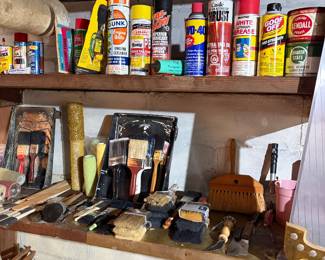 Paint brushes, paint rollers, with pans, lubricants, sanding blocks, vintage grease cans and much more.