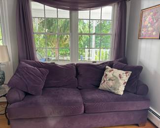 Plum colored sofa