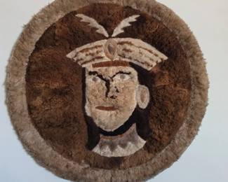 handmade Peruvian alpaca fur wall hanging featuring a depiction of an Inca god