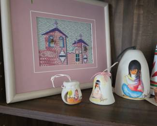 framed cross-stitch art & DeGrazia ceramic wind chime 
