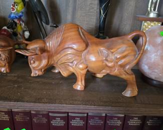  handcrafted wood bull sculpture features detailed carvings