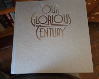 hardcover edition of the history book "Our Glorious Century,"