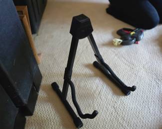 black Amazon Basics folding A-frame guitar stand