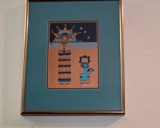 Native American art features a Yei figure holding an umbrella and is signed