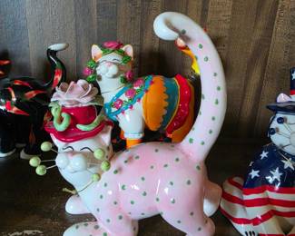 WhimsiClay "Rosette" and features painted green polka dots