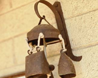 rustic metal cowbell / temple-bell style wind chime