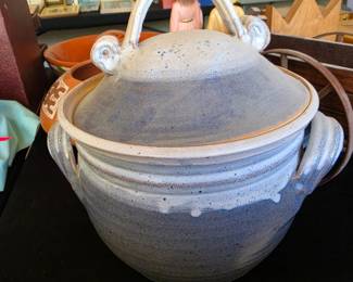 vintage studio pottery tureen features a rustic blue and white glaze
