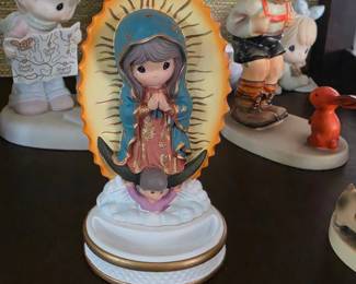 This is a Precious Moments "Our Lady of Guadalupe" resin rosary box featuring the Virgin Mary