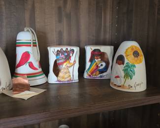 DeGrazia sandstone wind bell & "Ho'ok Basket of Many Children" clay luminary