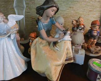 Lladró Gres figurine (#2169) titled "Repose," depicting a young girl stroking a cat on her lap