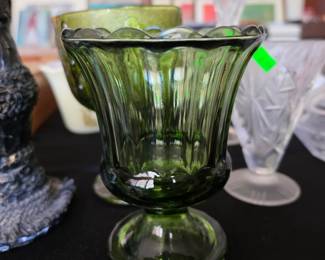 vintage Indiana Glass pedestal vase features a vibrant avocado green color
