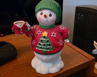 Precious Moments resin figurine features a musical snowman
