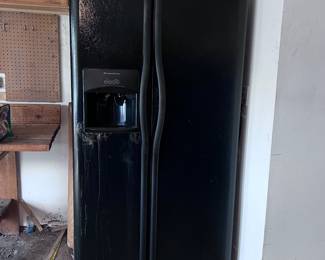 Large double door refrigerator. Needs Freon 