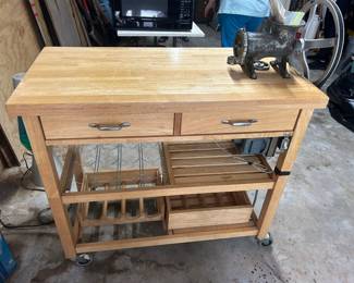 Rolling Bar Cart / Island with attached grinder Cart is in good condition Grinder motor turns on but will not spin wheel. 39” x 20” x 35” tall Must be able to move and load yourself