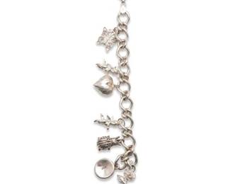 94 Sterling Silver Charm Bracelet, Seven Charms