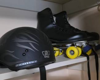 Roller skates and various styles of helmets