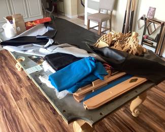 Billiard pool table disassembled for transport.