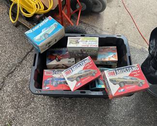 tote filled with vintage model cars by Revel, craft masters, etc.