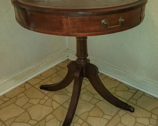 Leather topped drum table