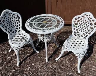 Vintage metal three-piece bistro set.