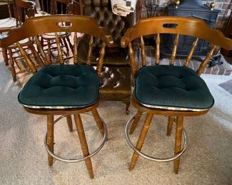 Pair of wooden swivel barstools, classic colonial design.