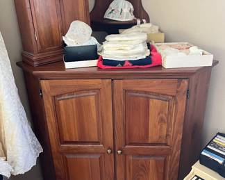 Traditional wood corner cabinet.