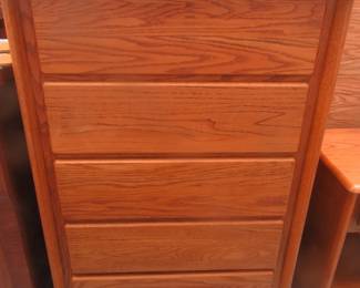 5 drawer heavy chest of drawers that match headboard and nightstand.