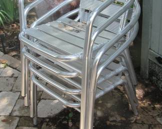 Four aluminum chairs.
