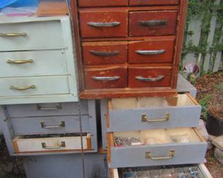 Multiple cabinets with lots of new bolts and screws