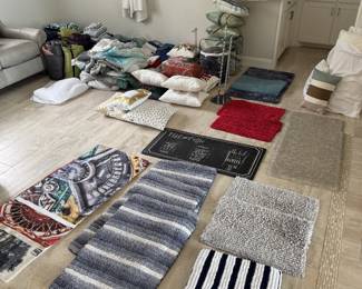 Bath rugs, robes, blankets, sheets, comforters, etc.