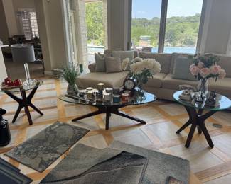 Glass side tables with wooden legs