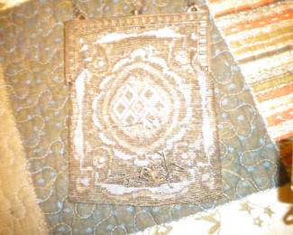 Beaded bag with damage
