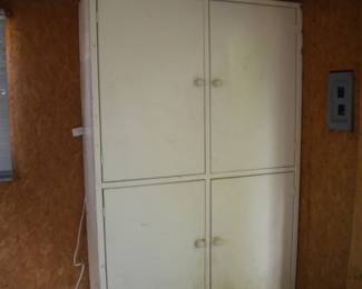 Vintage metal 4 door cabinet  You will need help to load this!!!