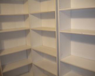 3 separate bookshelves or storage shelves