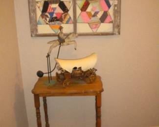 Framed quilt pieces antique replica covered wagon